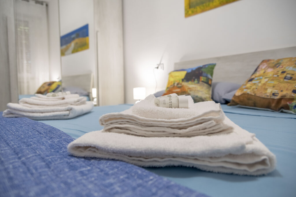 Casa Vacanze Le Mura - Dettagli decorativi letto